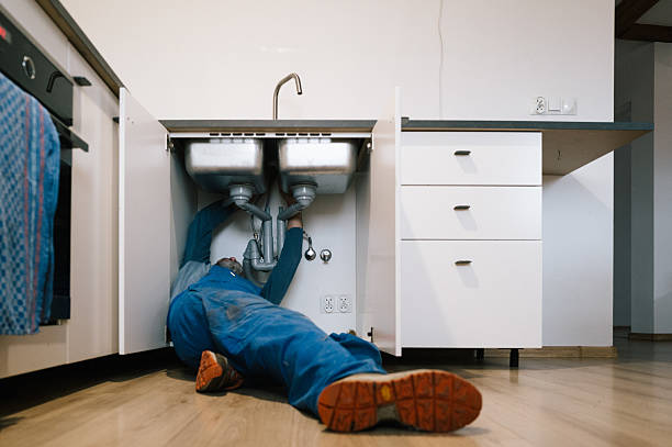 Professional Drain Cleaning technician working in Merrimack, NH